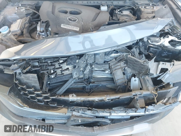 2023 Mazda CX-50 Premium Plus with VIN 7MMVABEY8PN100311, listed as a IAAI auction lot 42626276 with 40,242 mi miles and . Bid and sale history available at DreamBid. Image 10.