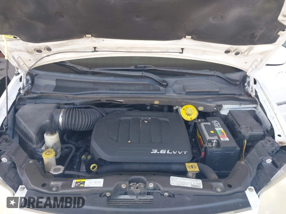 2013 Chrysler Town & Country Touring with VIN 2C4RC1BG3DR816341, listed as a IAAI auction lot 42024017 with 154,787 mi miles and . Bid and sale history available at DreamBid. Image 10.