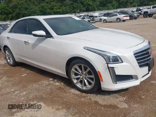 2019 Cadillac CTS Luxury AWD with VIN 1G6AX5SSXK0133074, listed as a IAAI auction lot 42285108 with 84,142 mi miles and . Bid and sale history available at DreamBid. Image 1.