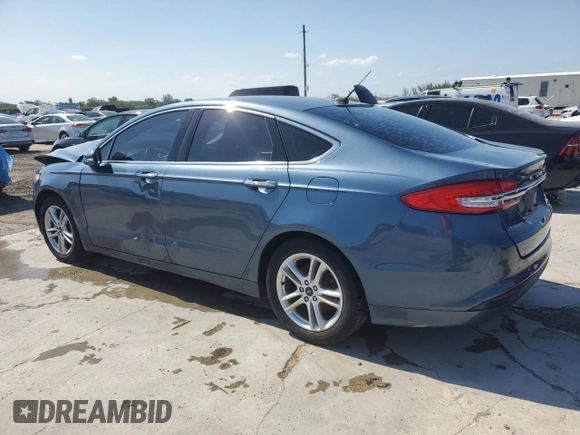 2018 Ford Fusion SE z VIN 3FA6P0HD7JR180095, wystawiony jako Copart lot #55980745 z przebiegiem 76 994 mil mil oraz Czysty tytuł • Clean title. Historia ofert i sprzedaży dostępna na DreamBid. Obrazek 2.