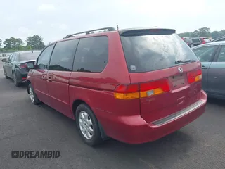 2002 Honda Odyssey EX with VIN 5FNRL18622B016265, listed as a IAAI auction lot 42294568 with 231,703 mi miles and . Bid and sale history available at DreamBid. Image 3.