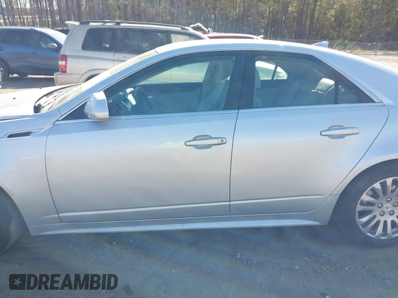 2013 Cadillac CTS Premium with VIN 1G6DP5E33D0175817, listed as a IAAI auction lot 41882197 with 116,645 mi miles and . Bid and sale history available at DreamBid. Image 14.