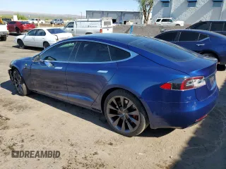 2019 Tesla Model S 100D with VIN 5YJSA1E40KF332077, listed as a Copart auction lot 53733965 with 33,098 mi miles and Salvage title. Bid and sale history available at DreamBid. Image 2.