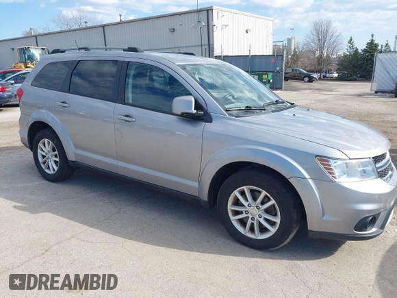 2017 Dodge Journey SXT z VIN 3C4PDDBG6HT595309, wystawiony jako IAAI lot #41918029 z przebiegiem 127 247 mil mil oraz . Historia ofert i sprzedaży dostępna na DreamBid. Obrazek 1.