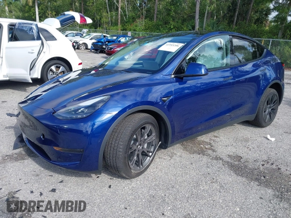 2025 Tesla Model Y Long Range z VIN 7SAYGDED0SF256650, wystawiony jako IAAI lot #41993206 z przebiegiem Nie podano mil oraz . Historia ofert i sprzedaży dostępna na DreamBid. Obrazek 17.
