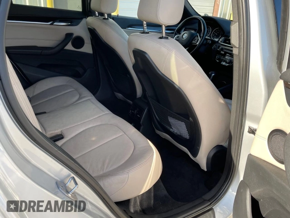 2017 BMW X1 sDrive28i with VIN WBXHU7C39H5H34971, listed as a Copart auction lot 51869265 with 108,051 mi miles and Clean Title. Bid and sale history available at carsss.com. Image 6.