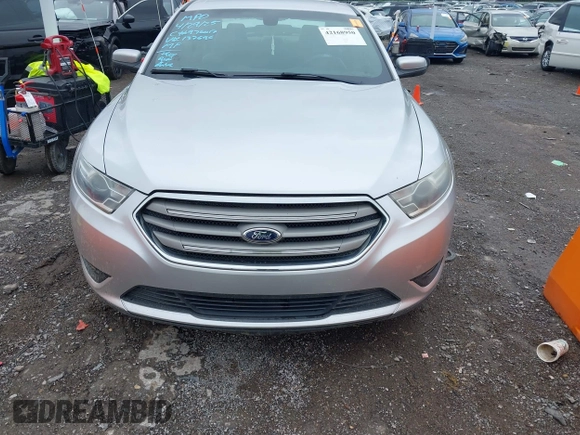 2015 Ford Taurus SEL with VIN 1FAHP2E91FG137696, listed as a IAAI auction lot 42168950 with 81,050 mi miles and . Bid and sale history available at DreamBid. Image 12.
