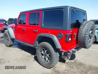 2020 Jeep Wrangler Unlimited Rubicon with VIN 1C4HJXFG2LW214874, listed as a IAAI auction lot 41679397 with 66,294 mi miles and . Bid and sale history available at DreamBid. Image 3.