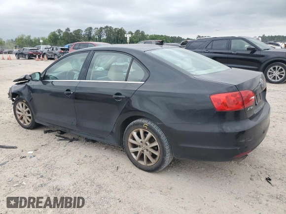 2013 Volkswagen Jetta SE with VIN 3VWDX7AJXDM400161, listed as a Copart auction lot 53249335 with 104,882 mi miles and Salvage title. Bid and sale history available at DreamBid. Image 2.