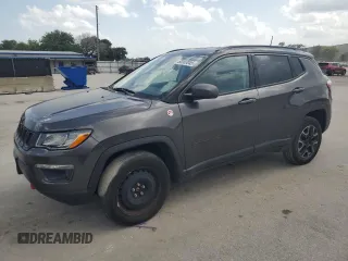 2019 Jeep Compass Trailhawk z VIN 3C4NJDDBXKT721356, wystawiony jako Copart lot #60003045 z przebiegiem 164 864 mil mil oraz Czysty tytuł • Clean title. Historia ofert i sprzedaży dostępna na DreamBid. Obrazek 1.