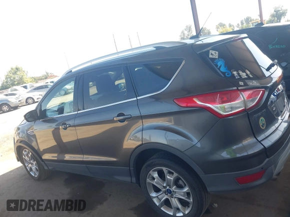 2015 Ford Escape Titanium with VIN 1FMCU0J92FUA20469, listed as a IAAI auction lot 42510293 with 161,466 mi miles and . Bid and sale history available at DreamBid. Image 15.