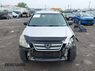 2006 Honda CR-V LX z VIN JHLRD785X6C006967, wystawiony jako IAAI lot #42279490 z przebiegiem 250 750 mil mil oraz . Historia ofert i sprzedaży dostępna na DreamBid. Obrazek 13.
