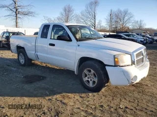 2006 Dodge Dakota SLT with VIN 1D7HW42KX6S716639, listed as a Copart auction lot 87942145 with Not Provided miles and Salvage Title. Bid and sale history available at carsss.com. Image 4.