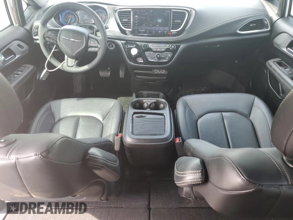 2024 Chrysler Pacifica Touring L with VIN 2C4RC1BG2RR116768, listed as a Copart auction lot 54598075 with 12,054 mi miles and Salvage title. Bid and sale history available at DreamBid. Image 8.