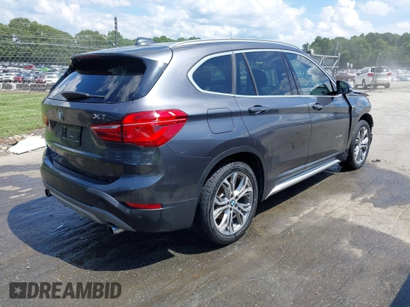 2017 BMW X1 xDrive28i with VIN WBXHT3Z38H4A55086, listed as a IAAI auction lot 42459276 with 101,907 mi miles and . Bid and sale history available at DreamBid. Image 4.