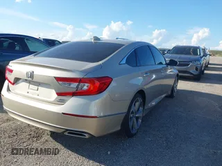 2020 Honda Accord Touring with VIN 1HGCV2F99LA029545, listed as a IAAI auction lot 40472177 with 44,960 mi miles and . Bid and sale history available at DreamBid. Image 4.