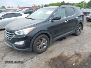 2014 Hyundai Santa Fe z VIN 5XYZUDLB8EG196450, wystawiony jako IAAI lot #42112914 z przebiegiem 91 710 mil mil oraz . Historia ofert i sprzedaży dostępna na DreamBid. Obrazek 2.