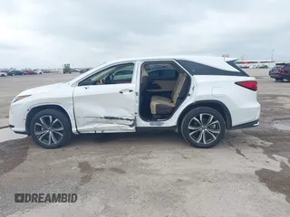 2019 Lexus RX 350L Premium with VIN JTJGZKCAXK2014142, listed as a IAAI auction lot 42374975 with 46,089 mi miles and . Bid and sale history available at DreamBid. Image 6.