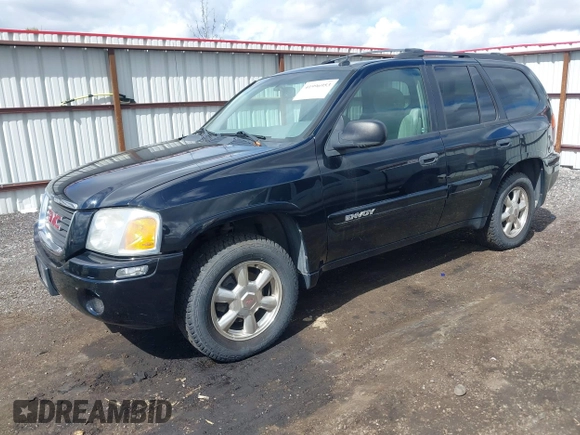 2005 GMC Envoy SLE with VIN 1GKDT13S552212811, listed as a IAAI auction lot 41996953 with 147,896 mi miles. Bid and sale history available at carsss.com. Image 2.