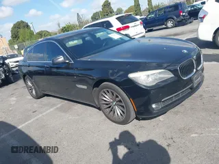 2012 BMW 7 Series 740i with VIN WBAKA4C5XCDS99253, listed as a IAAI auction lot 41710171 with 176,907 mi miles. Bid and sale history available at carsss.com. Image 1.