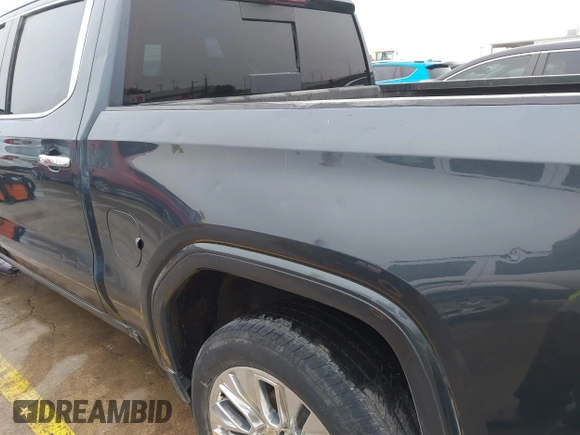 2020 GMC Sierra 1500 Denali z VIN 1GTU9FEL1LZ120581, wystawiony jako IAAI lot #41428827 z przebiegiem 97 917 mil mil oraz . Historia ofert i sprzedaży dostępna na DreamBid. Obrazek 17.