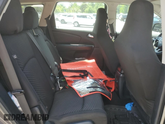 2017 Dodge Journey SXT z VIN 3C4PDCBG0HT509616, wystawiony jako Copart lot #55271225 z przebiegiem 107 099 mil mil oraz Szkoda całkowita • Salvage title. Historia ofert i sprzedaży dostępna na DreamBid. Obrazek 11.