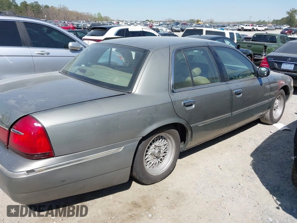 2001 Mercury Grand Marquis LS with VIN 2MEFM75W21X664449, listed as a IAAI auction lot 41898463 with 290,047 mi miles and . Bid and sale history available at DreamBid. Image 13.