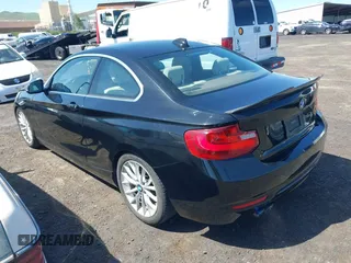 2016 BMW 2 Series 228i with VIN WBA1F9C5XGV545664, listed as a IAAI auction lot 39327505 with 94,583 mi miles. Bid and sale history available at carsss.com. Image 3.