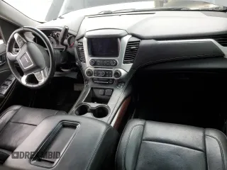 2015 GMC Yukon SLT z VIN 1GKS2BKC1FR112708, wystawiony jako Copart lot #53963165 z przebiegiem 123 331 mil mil oraz Szkoda całkowita • Salvage title. Historia ofert i sprzedaży dostępna na DreamBid. Obrazek 8.