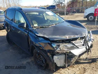 2014 Toyota RAV4 LE with VIN JTMBFREV9E5030687, listed as a IAAI auction lot 41095249 with 53,726 mi miles and . Bid and sale history available at DreamBid. Image 1.