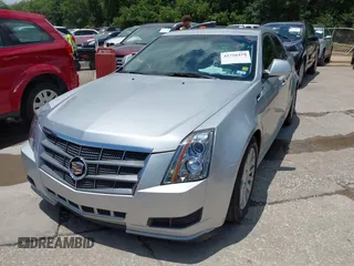2013 Cadillac CTS Luxury with VIN 1G6DE5E56D0179190, listed as a IAAI auction lot 42726459 with 145,393 mi miles and . Bid and sale history available at DreamBid. Image 2.