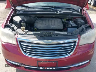2012 Chrysler Town & Country Touring-L with VIN 2C4RC1CG6CR144174, listed as a IAAI auction lot 42003682 with 172,453 mi miles. Bid and sale history available at carsss.com. Image 10.