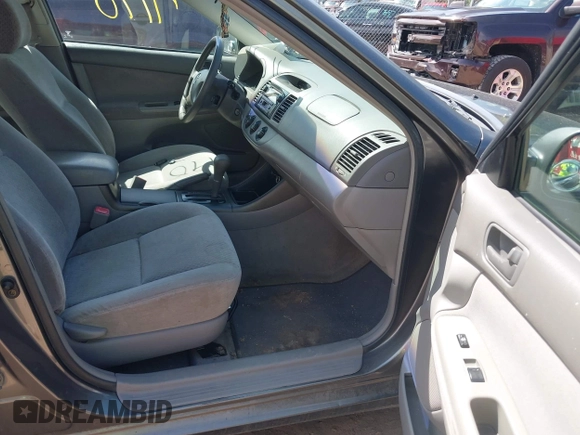 2004 Toyota Camry LE with VIN 4T1BE32K24U895575, listed as a IAAI auction lot 42067190 with 283,333 mi miles. Bid and sale history available at carsss.com. Image 5.