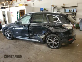 2018 BMW X1 xDrive28i with VIN WBXHT3C31J5L24230, listed as a Copart auction lot 56665305 with Not provided miles and Non repairable. Bid and sale history available at DreamBid. Image 2.