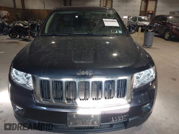 2013 Jeep Grand Cherokee Laredo with VIN 1C4RJFAG9DC583269, listed as a IAAI auction lot 41241085 with 147,995 mi miles. Bid and sale history available at carsss.com. Image 12.