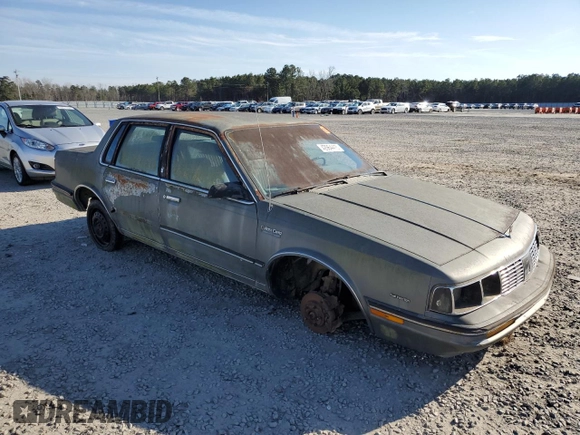 1986 Oldsmobile Cutlass Ciera with VIN 1G3AM19R8GG312651, listed as a Copart auction lot 42964415 with 67,874 mi miles and Clean Title. Bid and sale history available at DreamBid. Image 4.