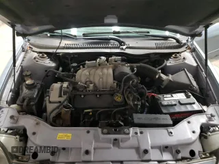 1997 Ford Taurus GL z VIN 1FALP52U9VG137092, wystawiony jako Copart lot #53430495 z przebiegiem 47 987 mil mil oraz Szkoda całkowita • Salvage title. Historia ofert i sprzedaży dostępna na DreamBid. Obrazek 13.