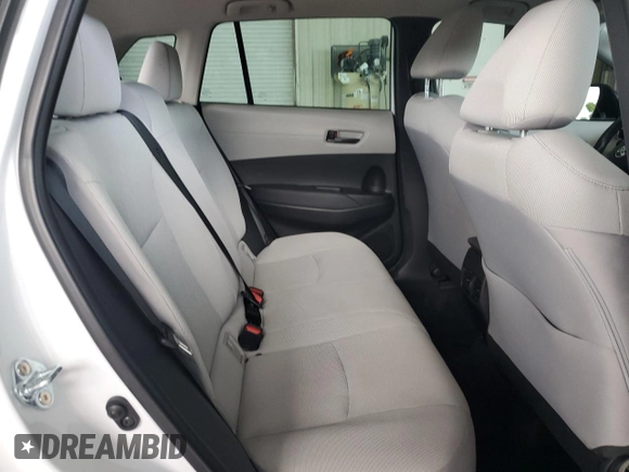 2023 Toyota Corolla Cross L z VIN 7MUAAAAG7PV053889, wystawiony jako Copart lot #61677525 z przebiegiem 27 970 mil mil oraz Szkoda całkowita • Salvage title. Historia ofert i sprzedaży dostępna na DreamBid. Obrazek 11.