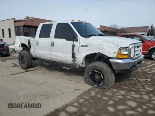 1999 Ford F-250 XL with VIN 1FTNX21S7XEE25340, listed as a Copart auction lot 45423925 with 324,950 mi miles and Salvage title. Bid and sale history available at DreamBid. Image 4.