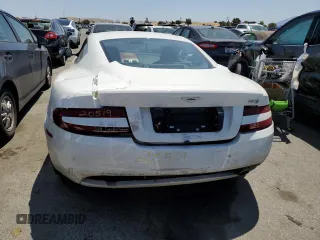 2009 Aston Martin DB9 z VIN SCFAD01E59GA10941, wystawiony jako Copart lot #57220313 z przebiegiem 24 818 mil mil oraz . Historia ofert i sprzedaży dostępna na DreamBid. Obrazek 6.