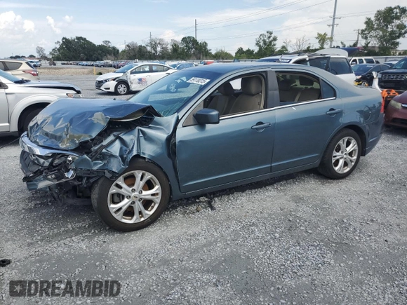 2012 Ford Fusion SE z VIN 3FAHP0HA1CR372744, wystawiony jako Copart lot #59118315 z przebiegiem Nie podano mil oraz Szkoda całkowita • Salvage title. Historia ofert i sprzedaży dostępna na DreamBid. Obrazek 1.