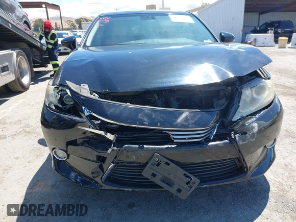 2013 Lexus ES 300h with VIN JTHBW1GG1D2034392, listed as a IAAI auction lot 42236596 with 207,830 mi miles and . Bid and sale history available at DreamBid. Image 6.