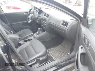 2011 Volkswagen Jetta SE with VIN 3VWDX7AJ7BM052493, listed as a IAAI auction lot 42745045 with 179,732 mi miles and . Bid and sale history available at DreamBid. Image 5.