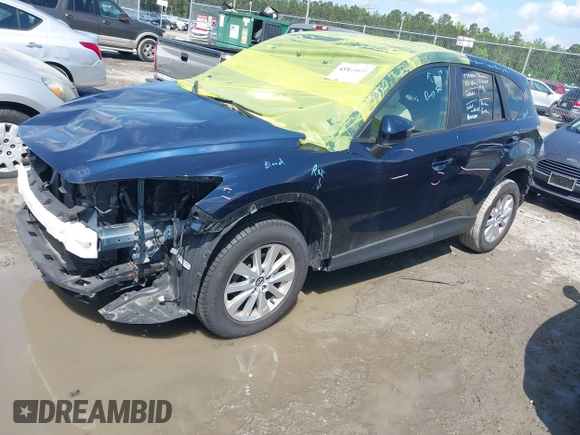2016 Mazda CX-5 Touring with VIN JM3KE4CY0G0916908, listed as a IAAI auction lot 41848823 with 53,255 mi miles. Bid and sale history available at carsss.com. Image 17.