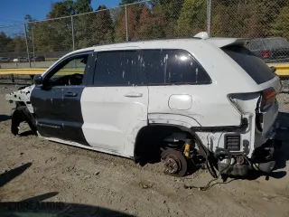 2021 Jeep Grand Cherokee SRT with VIN 1C4RJFDJ5MC584989, listed as a Copart auction lot 71048734 with 68,774 mi miles and Salvage Title. Bid and sale history available at carsss.com. Image 2.
