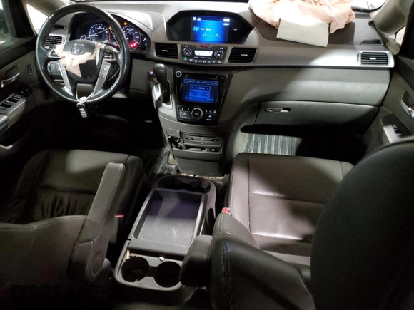 2014 Honda Odyssey Touring with VIN 5FNRL5H90EB137575, listed as a Copart auction lot 54606535 with 168,714 mi miles and Salvage title. Bid and sale history available at DreamBid. Image 8.