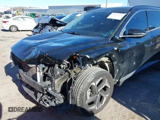 2022 Hyundai Tucson Limited with VIN 5NMJE3AEXNH001018, listed as a IAAI auction lot 41243221 with 81,590 mi miles. Bid and sale history available at carsss.com. Image 2.