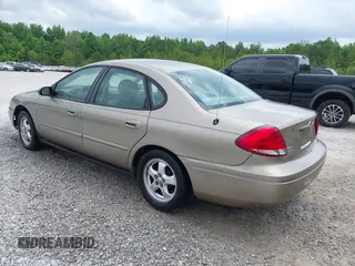 2004 Ford Taurus SES z VIN 1FAFP55S04G154644, wystawiony jako IAAI lot #42297704 z przebiegiem 155 736 mil mil oraz . Historia ofert i sprzedaży dostępna na DreamBid. Obrazek 3.