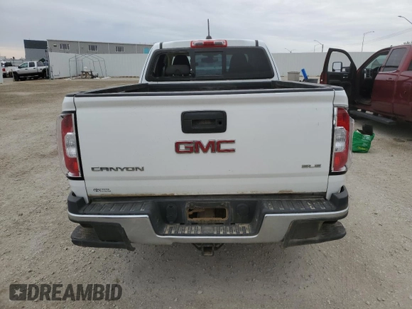 2015 GMC Canyon 4WD SLE with VIN 1GTH6BE38F1193615, listed as a Copart auction lot 69236954 with 201,201 mi miles and Salvage Title. Bid and sale history available at carsss.com. Image 6.