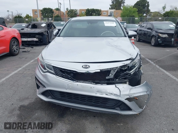 2019 Kia Optima LX z VIN 5XXGT4L3XKG285486, wystawiony jako IAAI lot #41872981 z przebiegiem 101 981 mil mil oraz . Historia ofert i sprzedaży dostępna na DreamBid. Obrazek 12.
